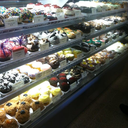 Photo taken at Crumbs Bake Shop by Sarah W. on 7/2/2012