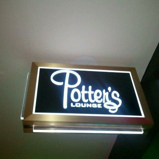 Photo taken at Potter&#39;s Lounge by Babs on 12/21/2011