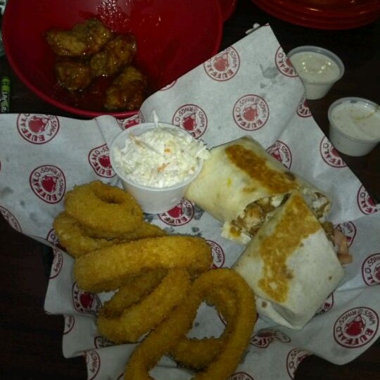 Photo taken at Wings &amp; Rings by Frank F. on 1/15/2012