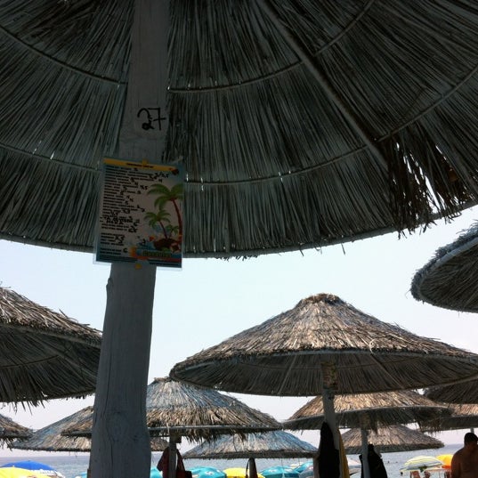 Photo taken at Mylos Beach Bar by Bizios A. on 6/24/2012