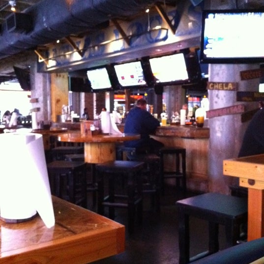 Photo taken at Ojos Locos Sports Cantina by Tyrie G. on 2/3/2012