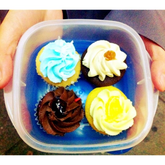 Photo taken at Cupcakes on Denman by Kimberley O. on 2/16/2012