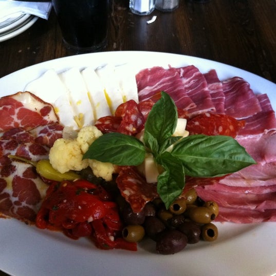 "Every weekday between 4pm-6pm Toby’s puts out antipasti at the bar for their patrons. These snacks change daily, but often include flatbread, olives, cheese etc." - eater.com