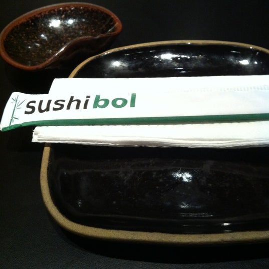 Photo taken at Sushibol by Andrea G. on 9/22/2011