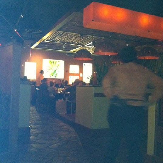 Photo taken at Agave Bar &amp; Grill by Steven K. on 11/22/2011