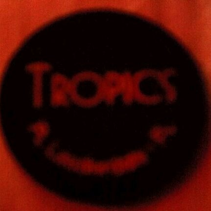 Photo taken at Tropics Piano Bar &amp; Restaurant by Jim G. on 1/20/2012