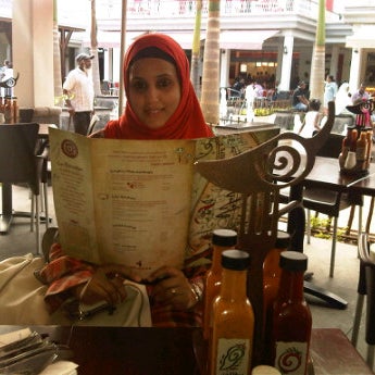 Photo taken at Nando&#39;s by Faadeel R. on 1/7/2012