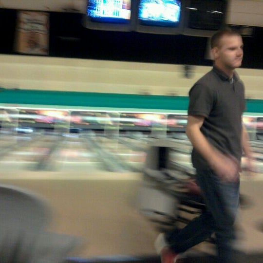 Photo taken at Sunset Bowl/Sporties by Julia E. on 12/17/2011