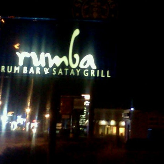 Photo taken at Rumba Rum Bar &amp; Satay Grill by Tracerx7 on 1/30/2011