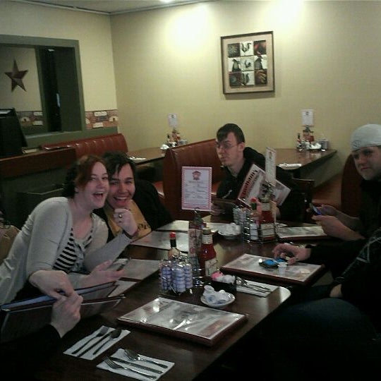 Photo taken at Gingham&#39;s Homestyle Restaurant by Lindsey N. on 1/5/2012