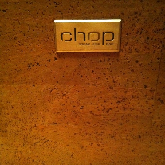 Photo taken at Chop Steakhouse &amp; Bar by Logan U. on 4/21/2012