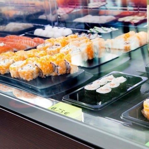 Photo taken at Sushi Store Express by Ignacio G. on 12/19/2011