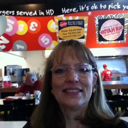 Photo taken at MOOYAH Burgers, Fries &amp; Shakes by Linda N. on 7/18/2011