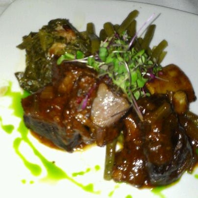 Снимок сделан в Corlette NY Restaurant &amp; Lounge Caribbean Tacqueria пользователем Raine 5/14/2012
