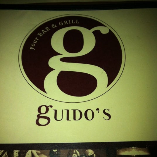 Photo taken at Guido&#39;s Bar &amp; Grill by Chris B. on 2/10/2012