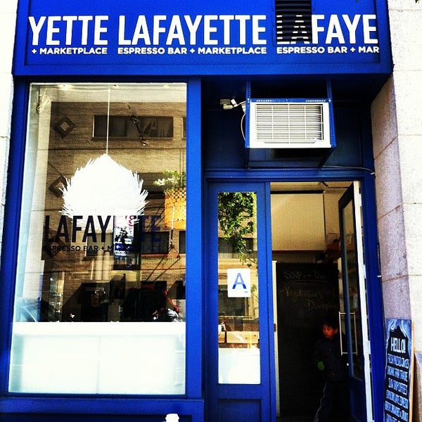 Photo taken at Lafayette Espresso Bar + Marketplace by Cindy T. on 4/6/2012