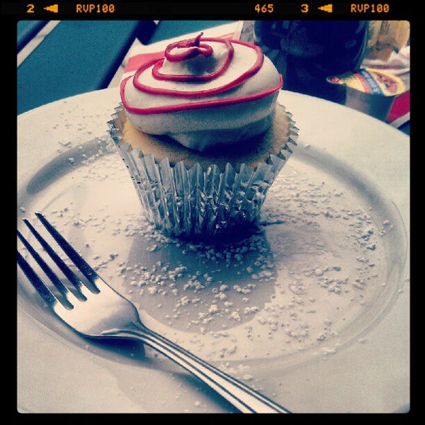 Photo taken at Firefly Cupcakes by Angela Z. on 6/24/2012