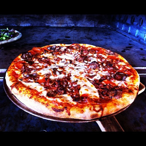 Photo taken at Solorzano Bros. Pizza by Carlos S. on 9/2/2012