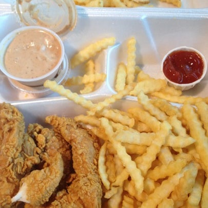 Photo taken at Raising Cane&#39;s Chicken Fingers by Lisa R. on 7/18/2012