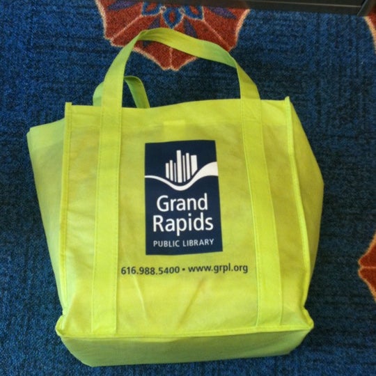 You can get a FREE green bag at the circulation desk. If you already received one it costs a dollar.