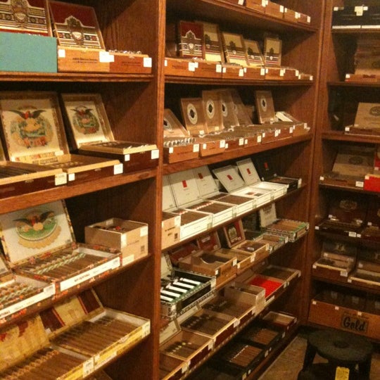 Photo taken at Humidour Cigar Shoppe by Nathalia C. on 11/6/2011