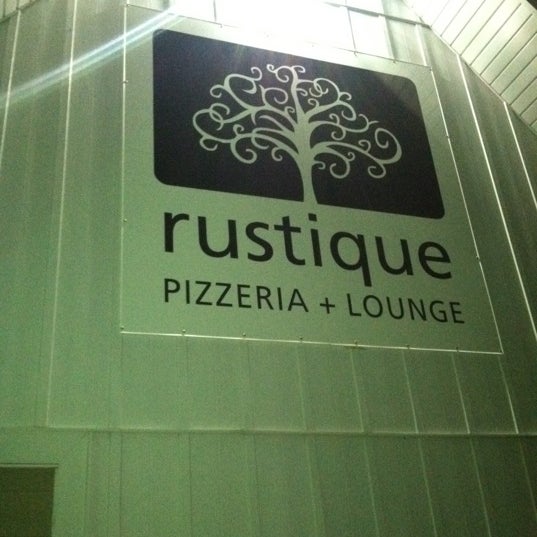 Photo taken at Rustique Pizzeria &amp; Lounge by Ron ⚽. on 2/11/2012