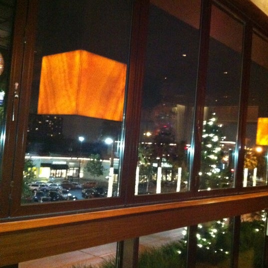 Photo taken at Up Restaurant by Loretta N. on 3/2/2012