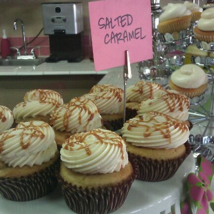 Photo taken at Let Them Eat Cupcakes by Anna F. on 6/12/2012