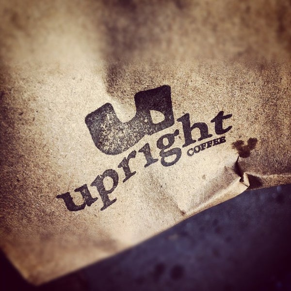 Photo taken at Upright Coffee by Sandy S. on 8/22/2012