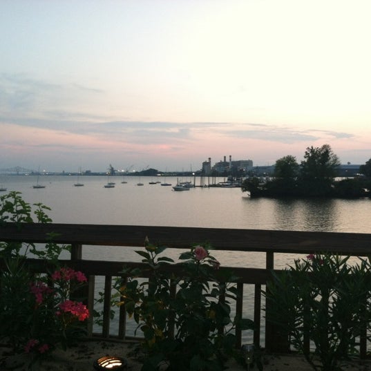 Photo taken at The Deck at Harbor Pointe by Deb P. on 8/5/2012