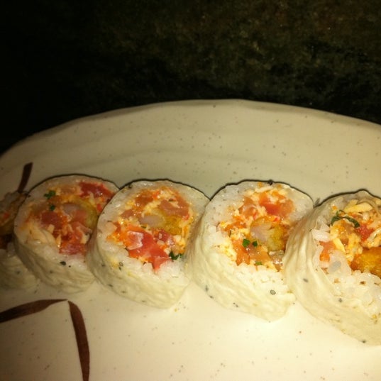 Photo taken at The Landing Grill &amp; Sushi Bar by Laura C. on 1/23/2012