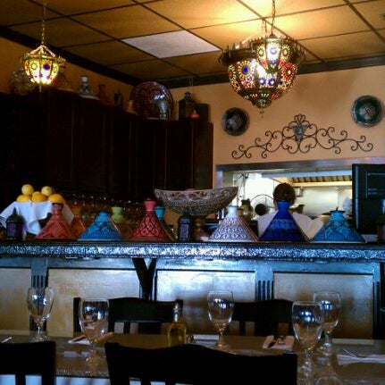 Photo taken at Saffron Cafe by Nicki L. on 8/30/2011