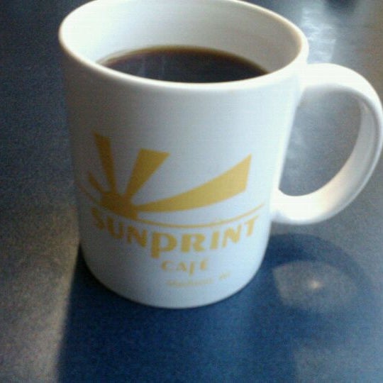 Foto tirada no(a) Sunprint Cafe por Emily F. em 5/26/2012