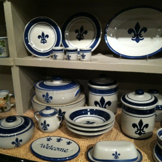 Photo taken at Louisville Stoneware by Amy W. on 6/13/2012