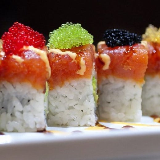 Foto tirada no(a) Fusion Fire Asian Fondue &amp; Sushi Bar por Frank D. em 11/7/2011