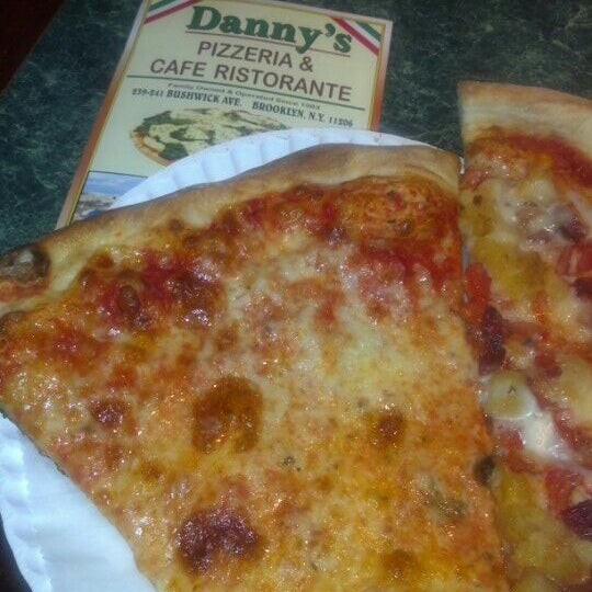 Photo taken at Danny&#39;s Pizzeria by Miguel G. on 7/28/2012