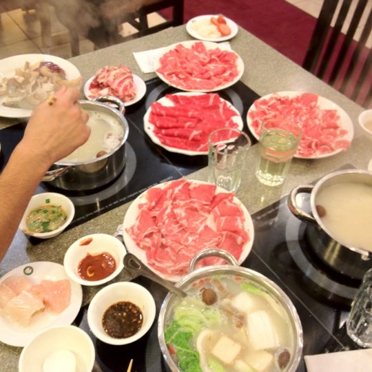 Photo taken at Happy Lamb Hot Pot by Liying T. on 1/24/2012