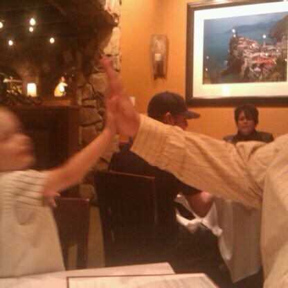 Photo taken at Romano&#39;s Macaroni Grill by The Real D. on 2/9/2011