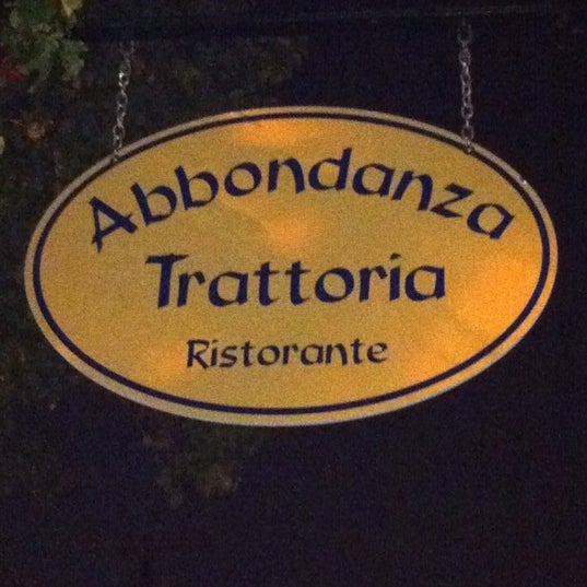 Photo taken at Abbondanza Trattoria &amp; Brick Oven Pizza by Salina M. on 9/3/2011