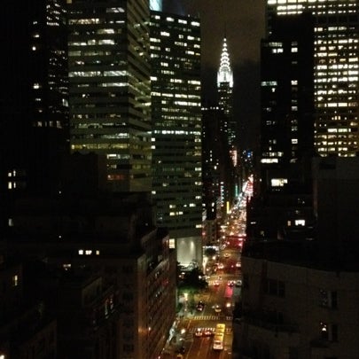 Photo taken at Renaissance New York Hotel 57 by Christine on 7/31/2012