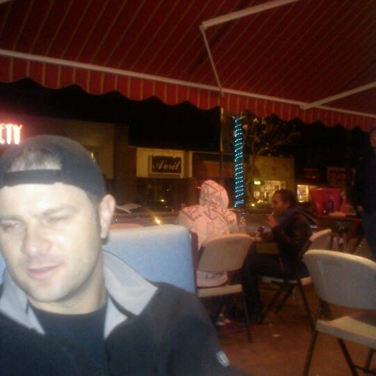 Photo taken at Sinbad Cafe &amp; Hookah Bar by M@ M. on 3/18/2012