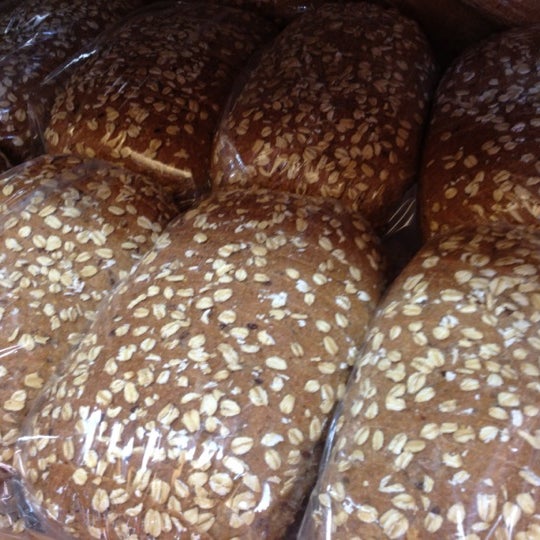 Photo taken at Aspen Mills Bakery &amp; Bread Company by Assana F. on 3/31/2012