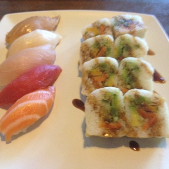 Photo taken at Sushi Delight by Tim C. on 5/7/2012