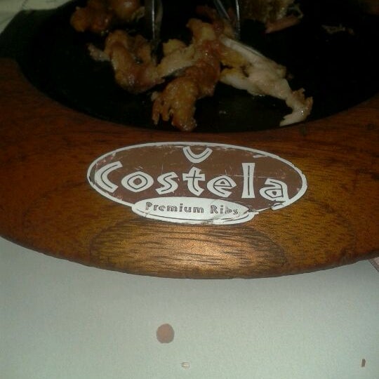 Photo taken at Costela Premium Ribs by Claudině J. on 3/13/2012