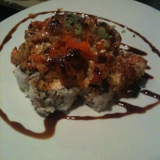 Photo taken at Fusion Sushi by Kris D. on 3/18/2012