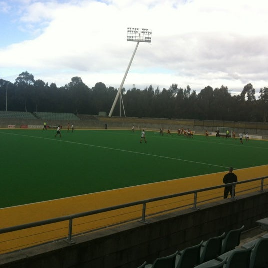 Photo taken at Sydney Olympic Park Hockey Centre by Mark M. on 9/1/2012