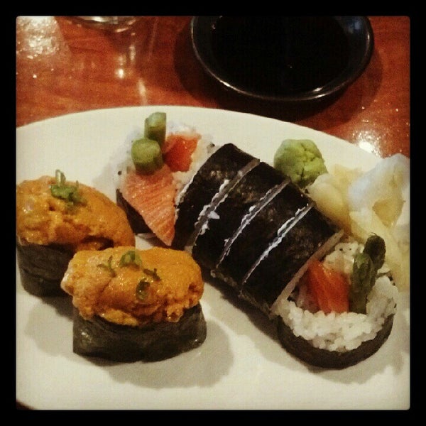 Photo taken at Sushi Neko by Liz S. on 7/27/2012