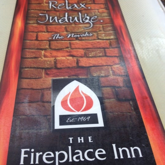 Photo taken at The Fireplace Inn by CjAy on 6/30/2012
