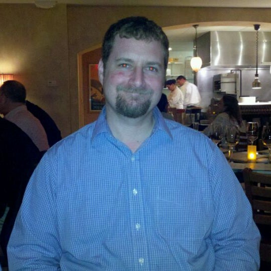 Photo taken at Tomasso Trattoria &amp; Enoteca by Tiffany C. on 12/21/2011