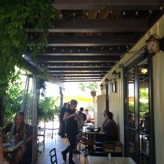 Photo taken at Bell Tower Cafe by Max B. on 7/29/2012